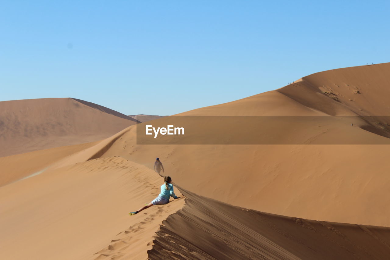 Scenic view of desert against clear sky