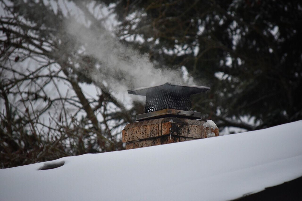 LOW ANGLE VIEW OF BUILT STRUCTURE WITH SNOW