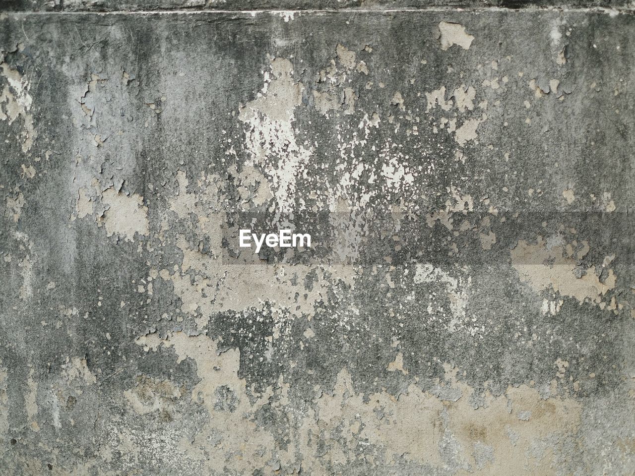CLOSE-UP OF WEATHERED WALL