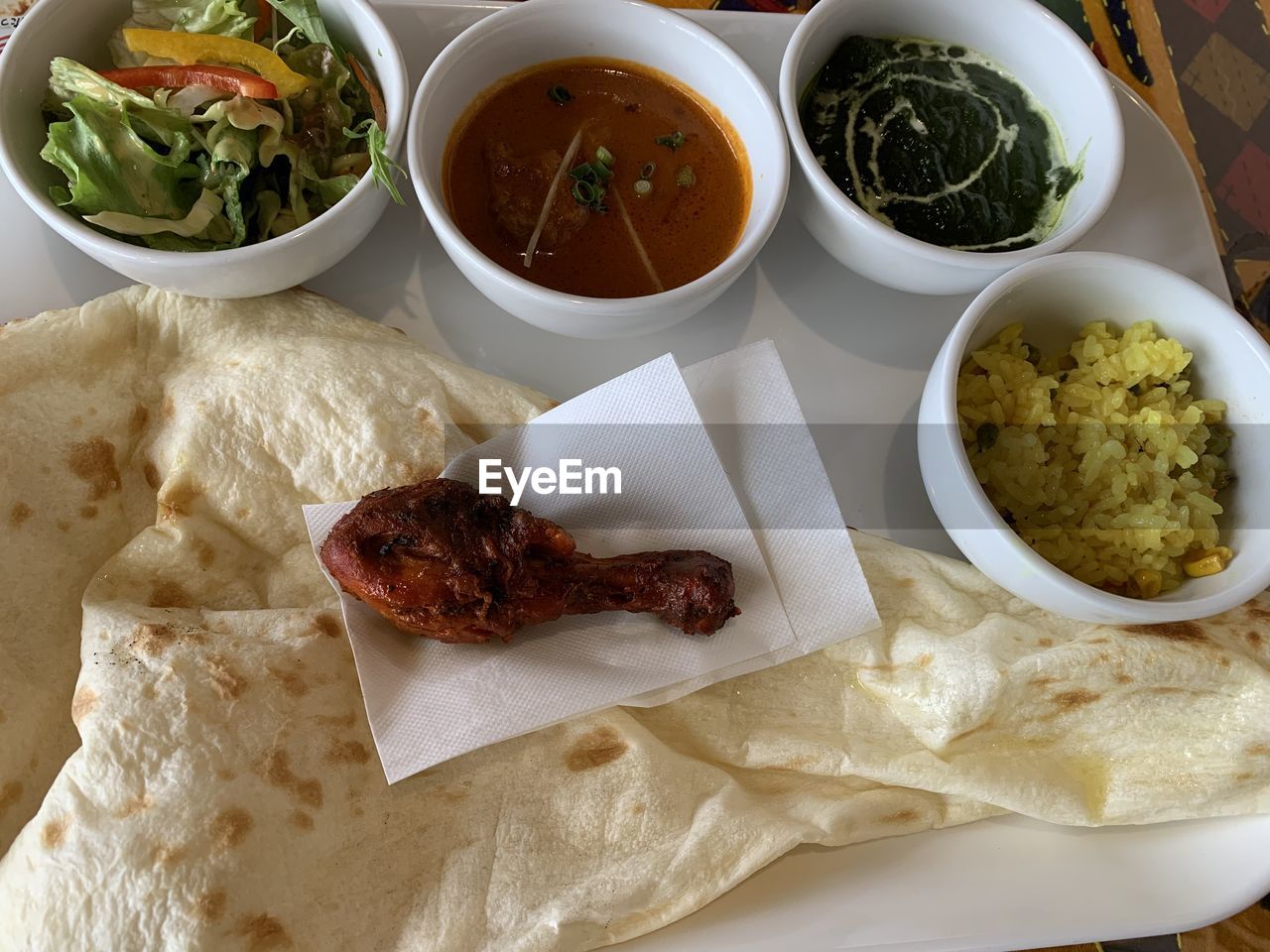 HIGH ANGLE VIEW OF FOOD IN PLATE ON TABLE