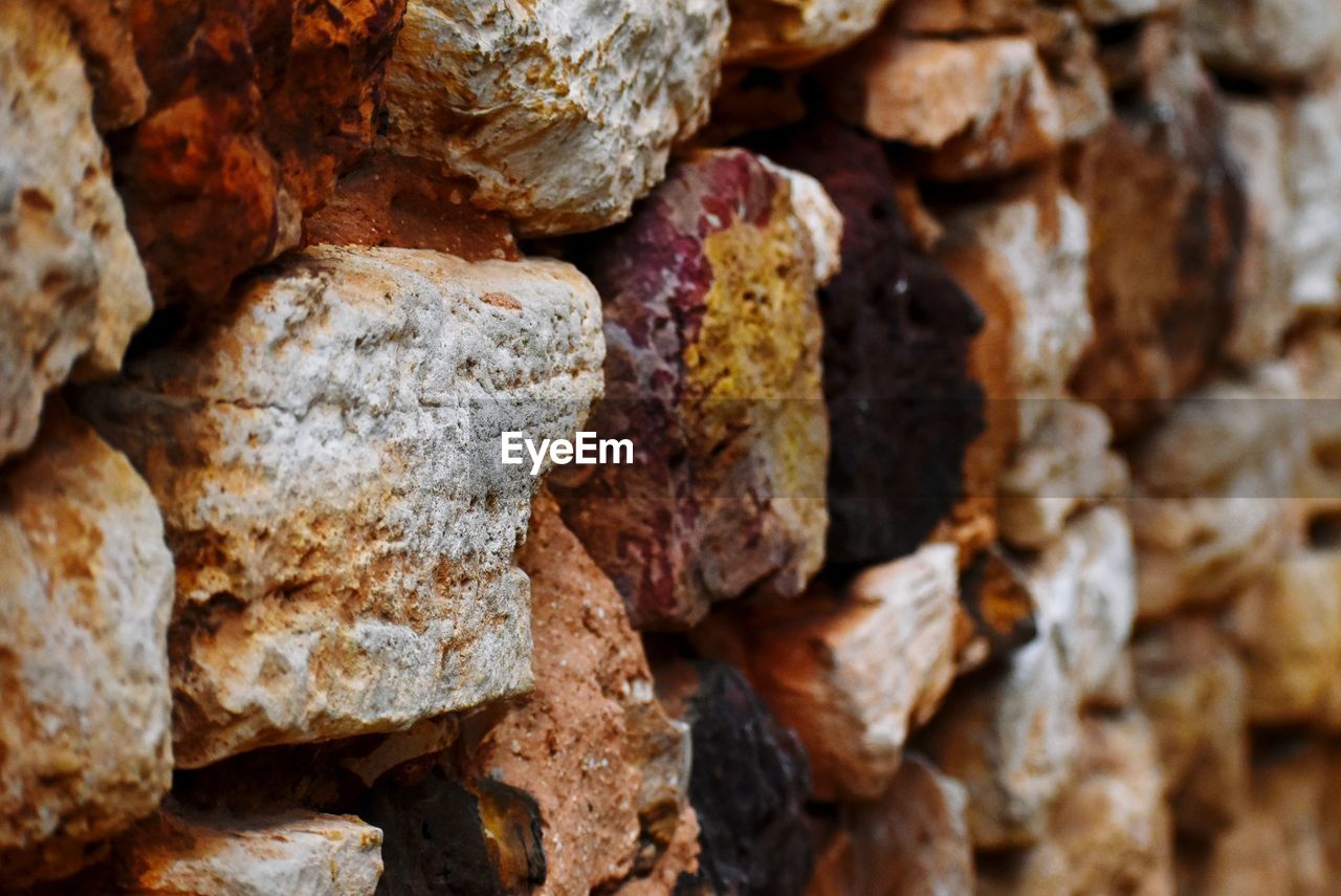 full frame shot of weathered stone wall