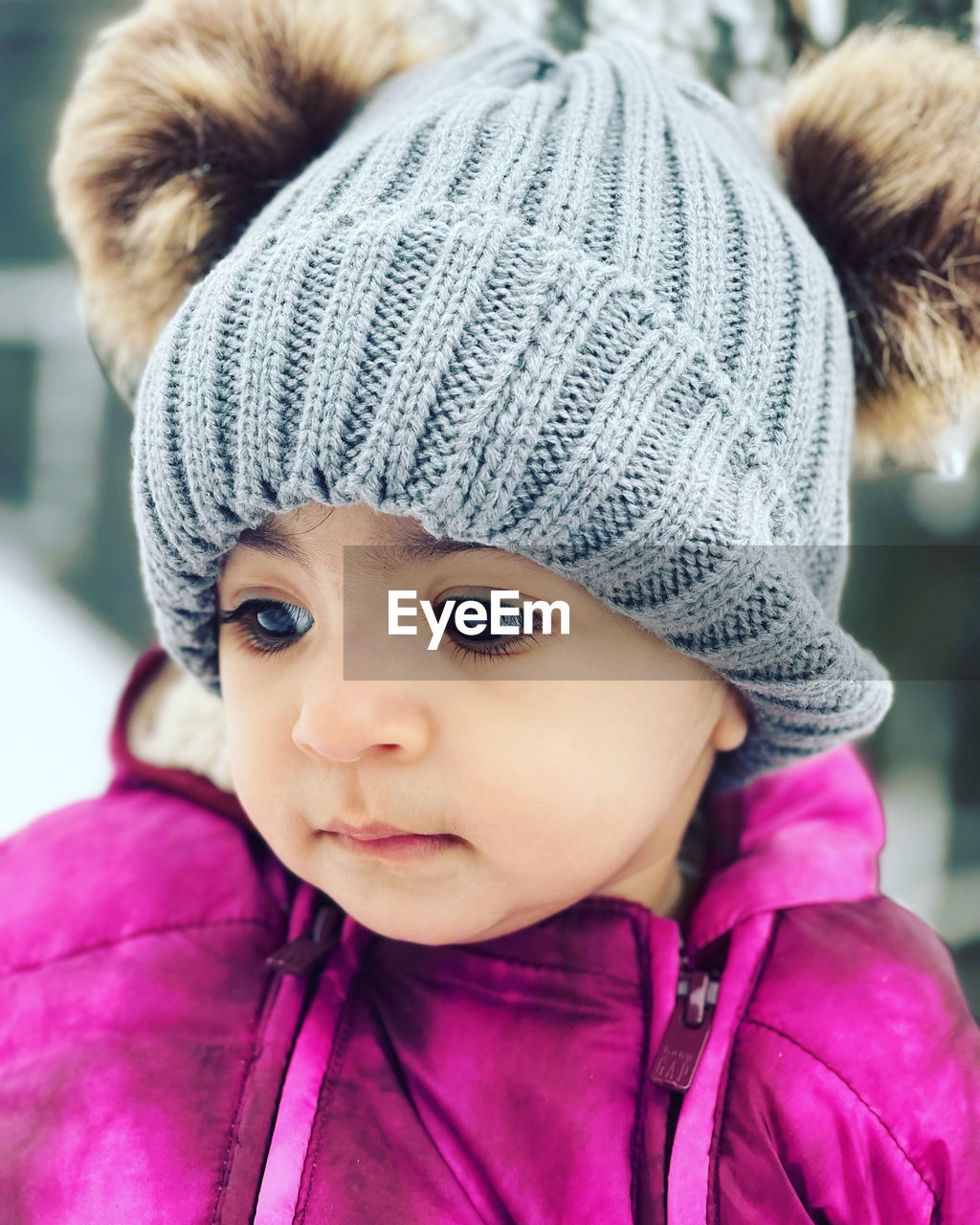 close-up portrait of girl looking away