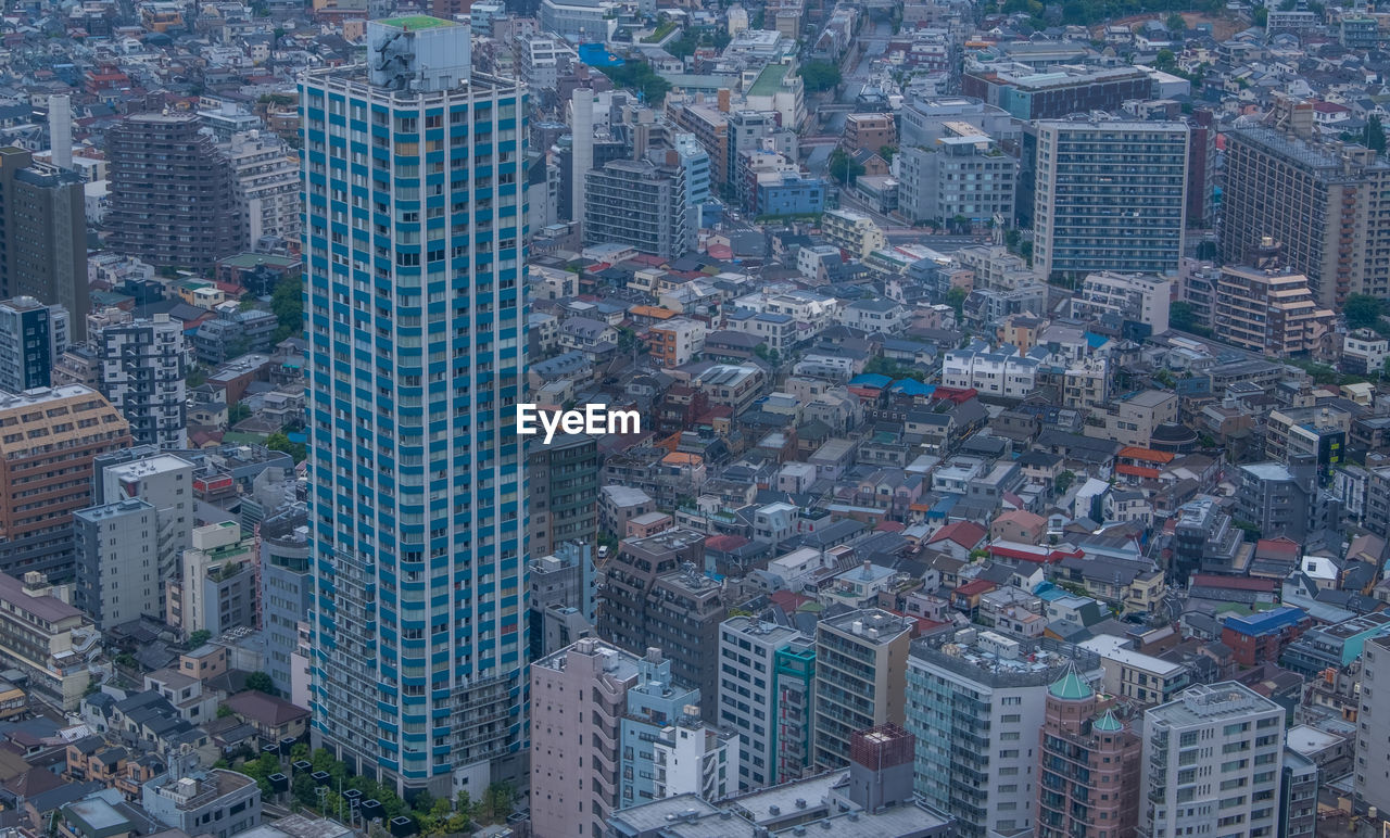 HIGH ANGLE VIEW OF MODERN CITY BUILDINGS