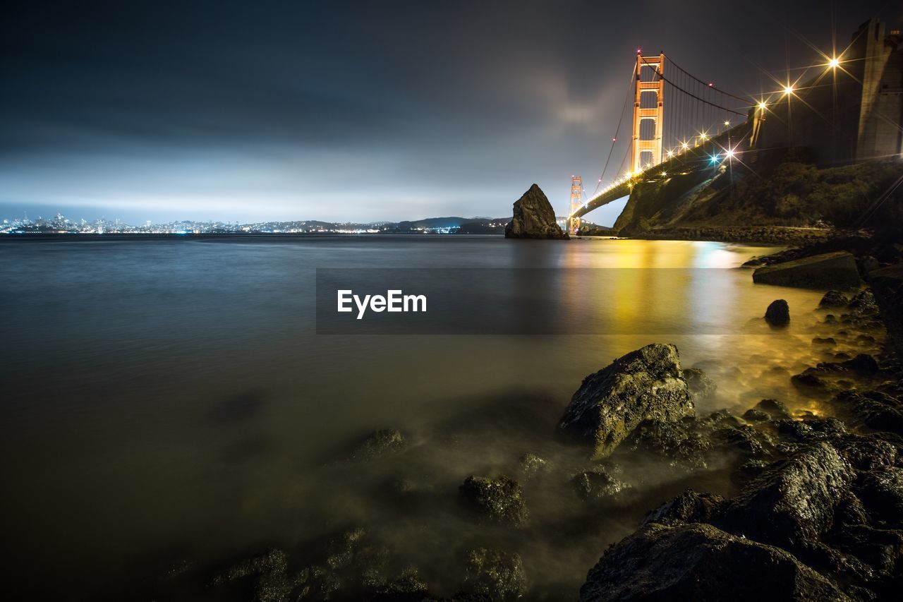 Illuminated golden gate bridge at night