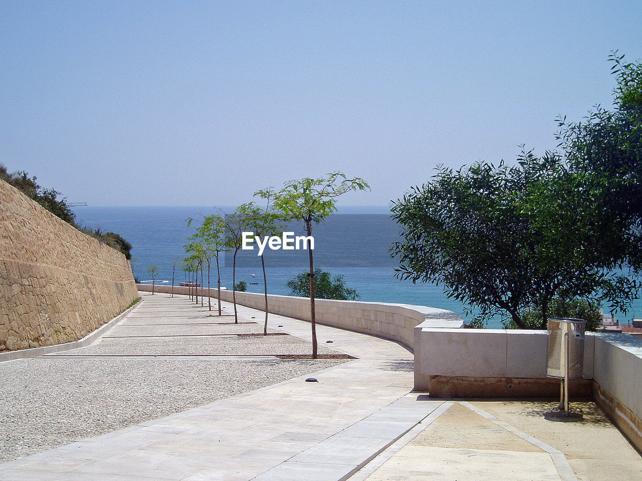 VIEW OF CALM SEA AGAINST CLEAR SKY