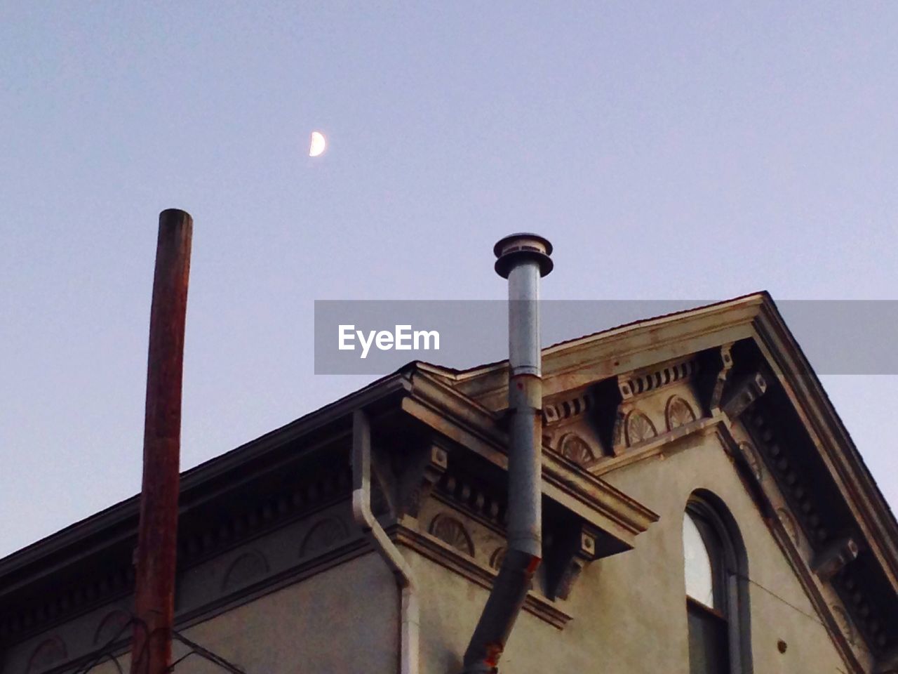 LOW ANGLE VIEW OF STREET LIGHT AGAINST SKY