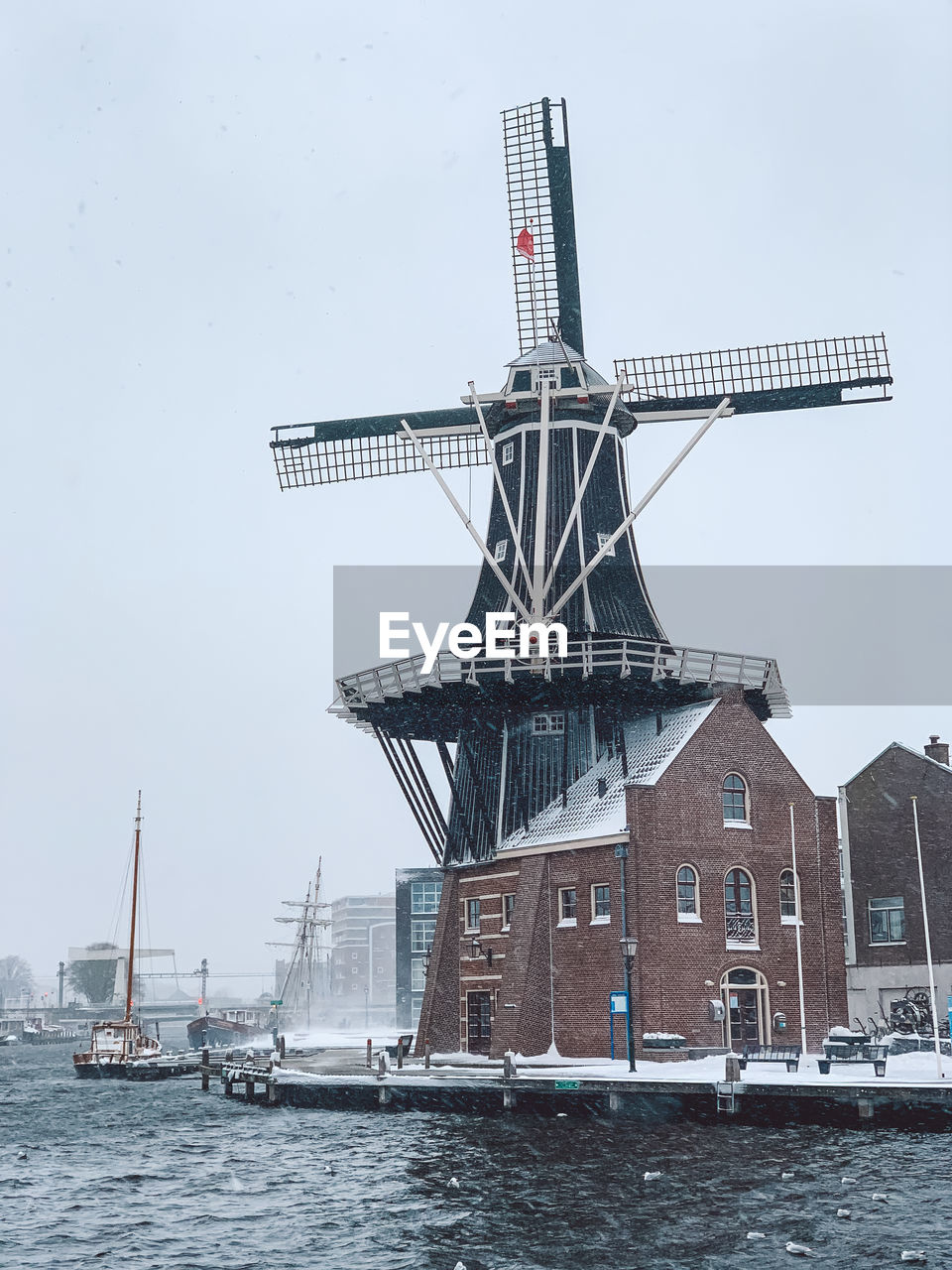 Traditional windmill against sky