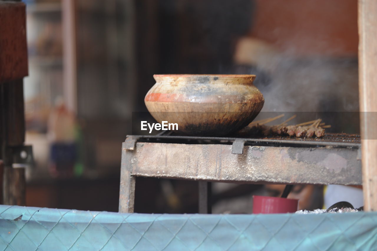 Close-up of meat on barbecue grill