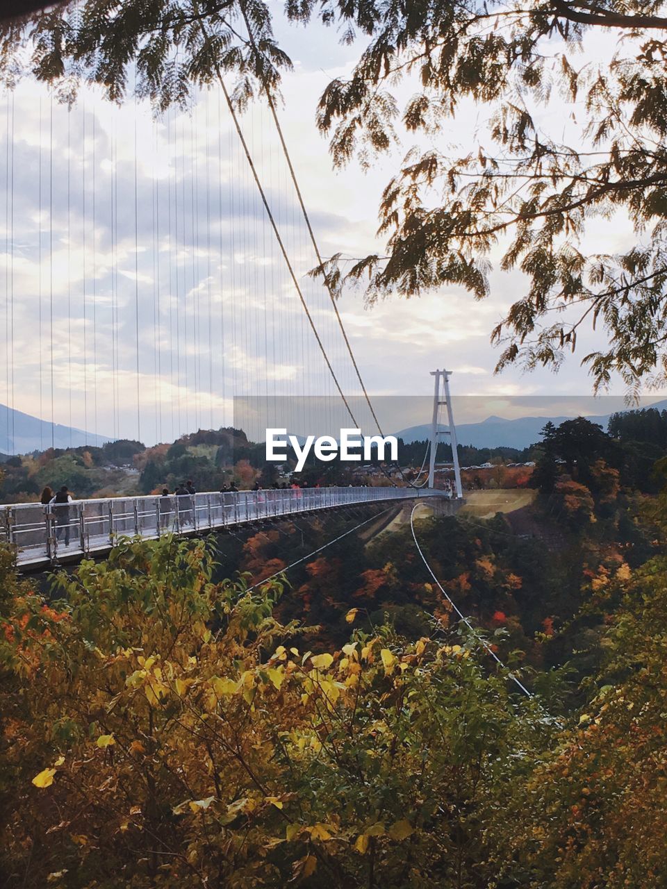 View of bridge against cloudy sky