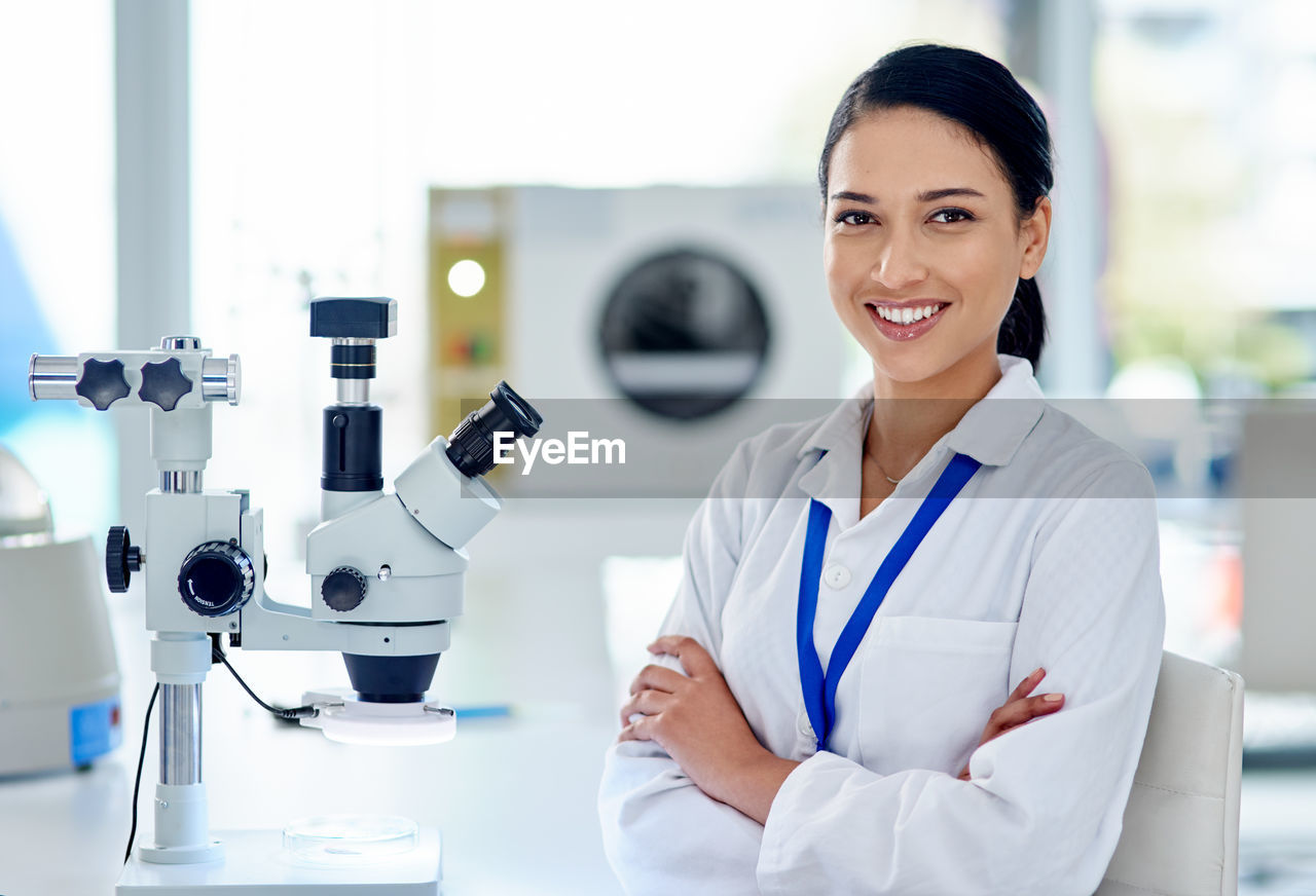 Portrait of doctor standing in laboratory