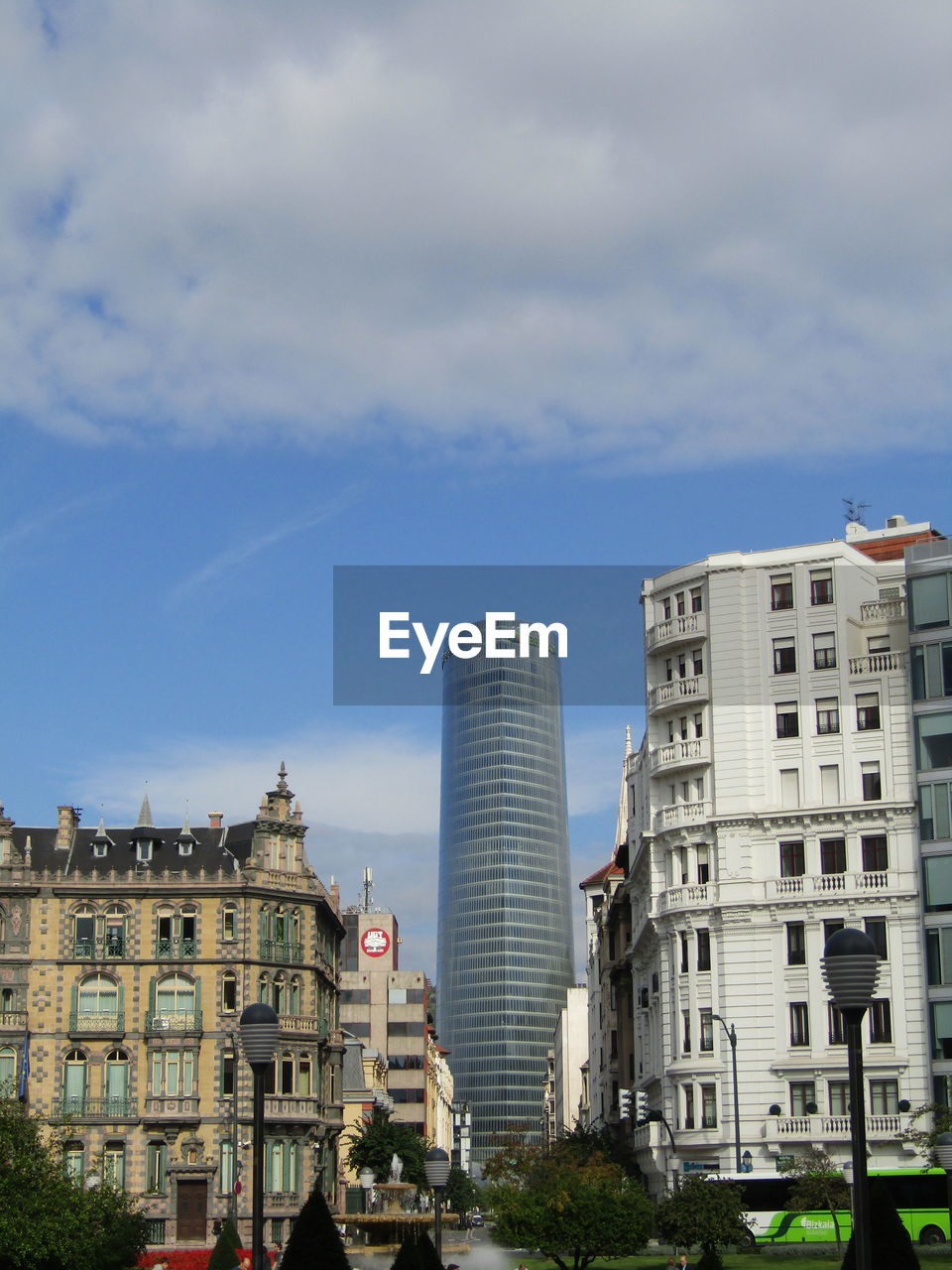 BUILDINGS IN CITY AGAINST SKY