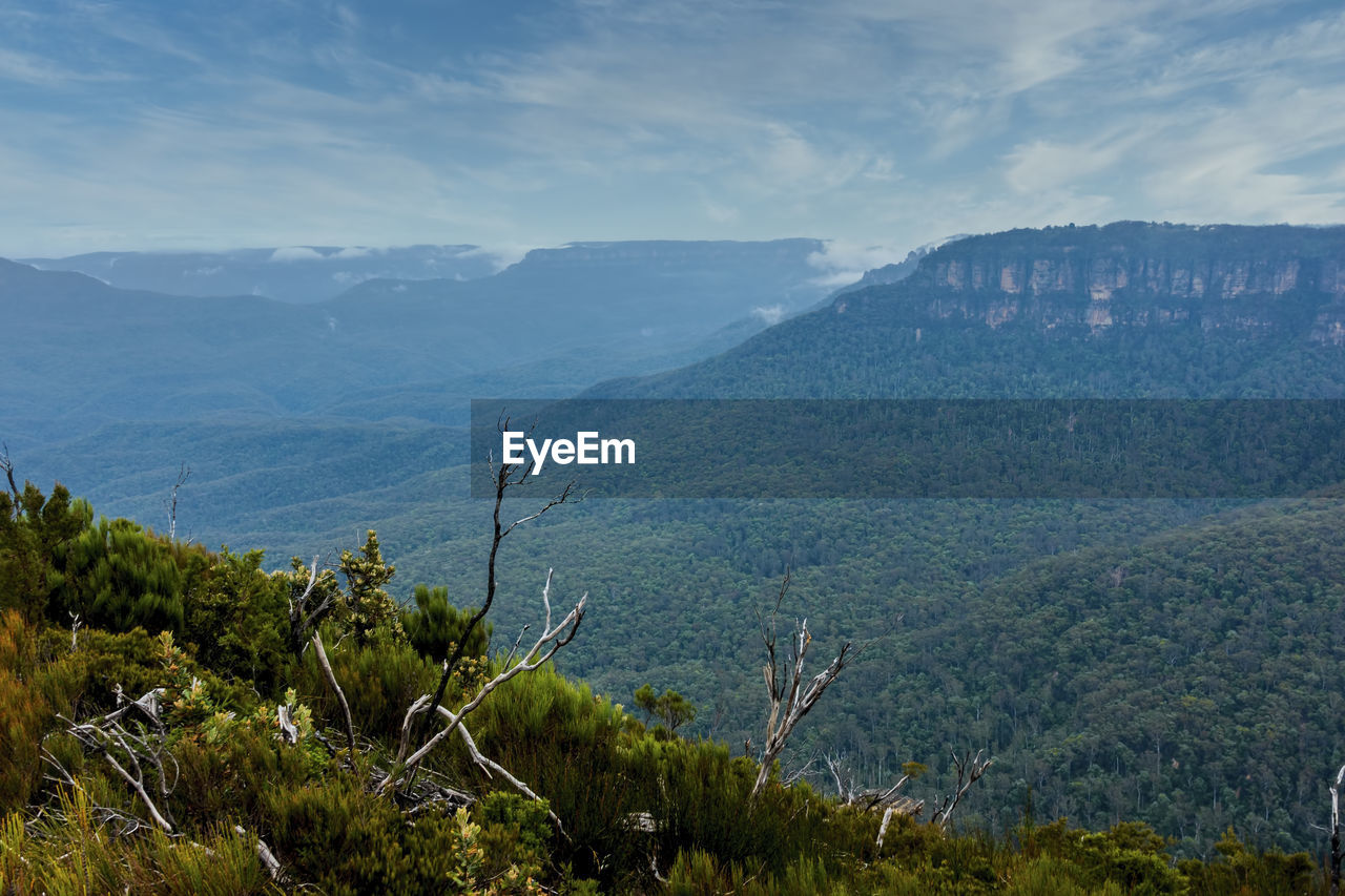 Scenic view of mountains against sky