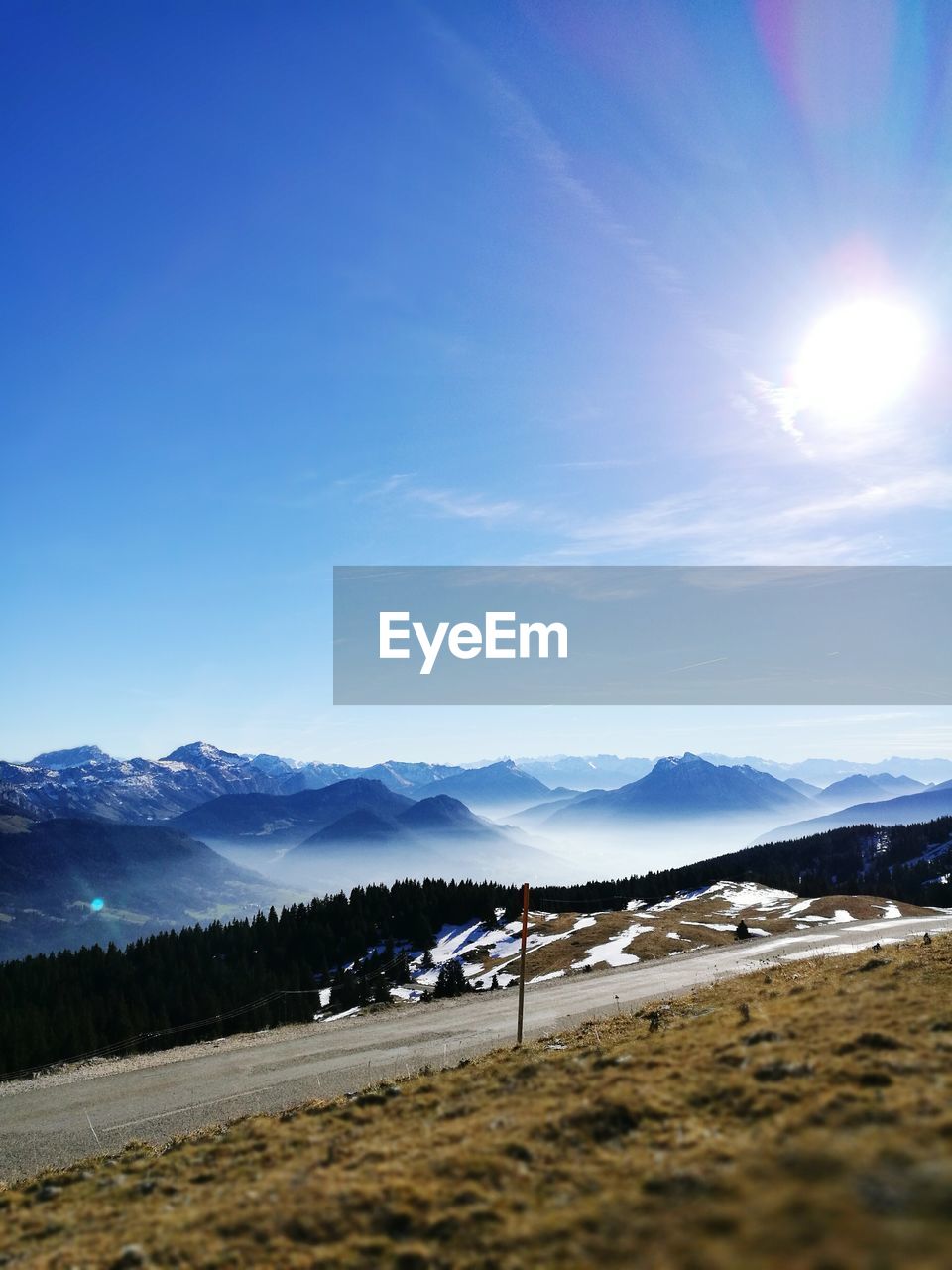 PANORAMIC VIEW OF MOUNTAINS AGAINST SKY