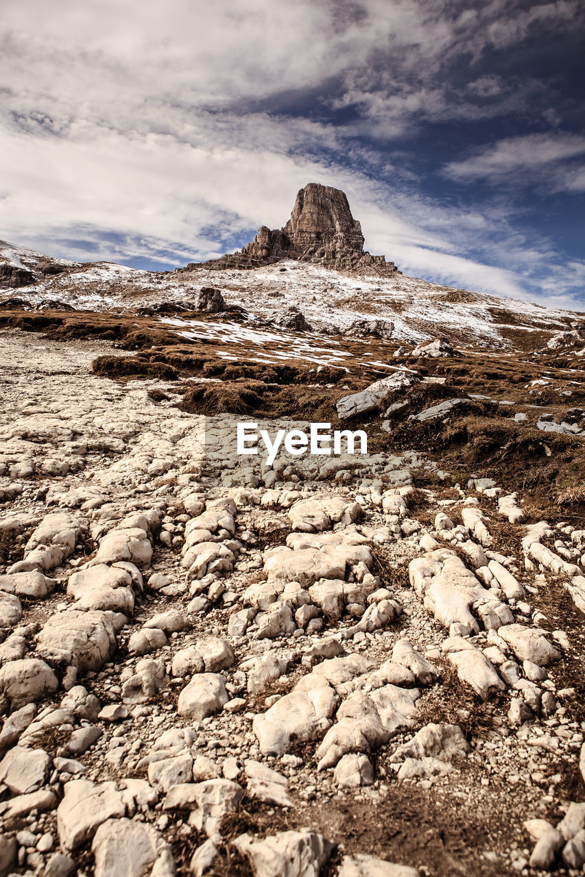 Rocks on mountains against sky