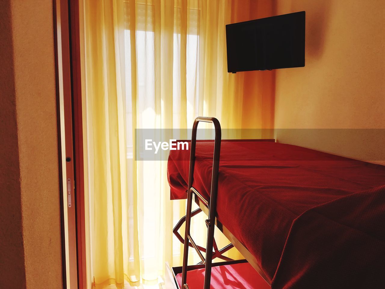 Empty bunk bed by window at home