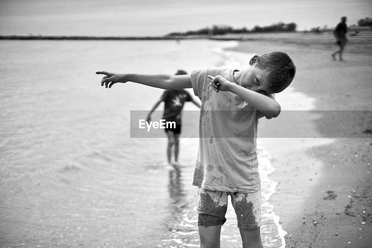 Portrait of boy posing at beach