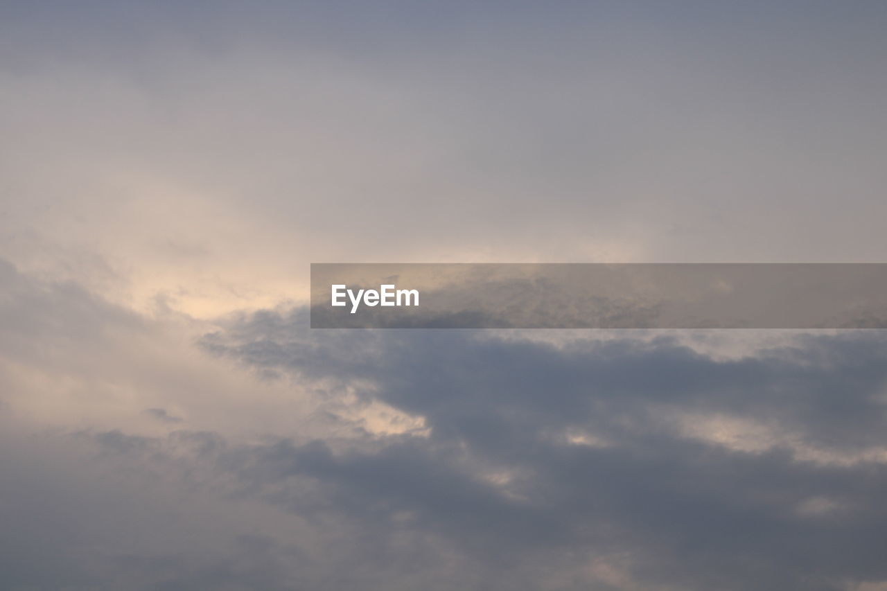 LOW ANGLE VIEW OF CLOUDY SKY DURING SUNSET