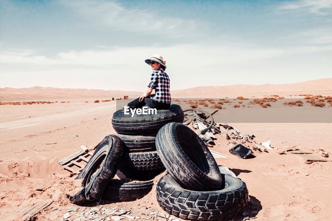 MAN STANDING IN DESERT