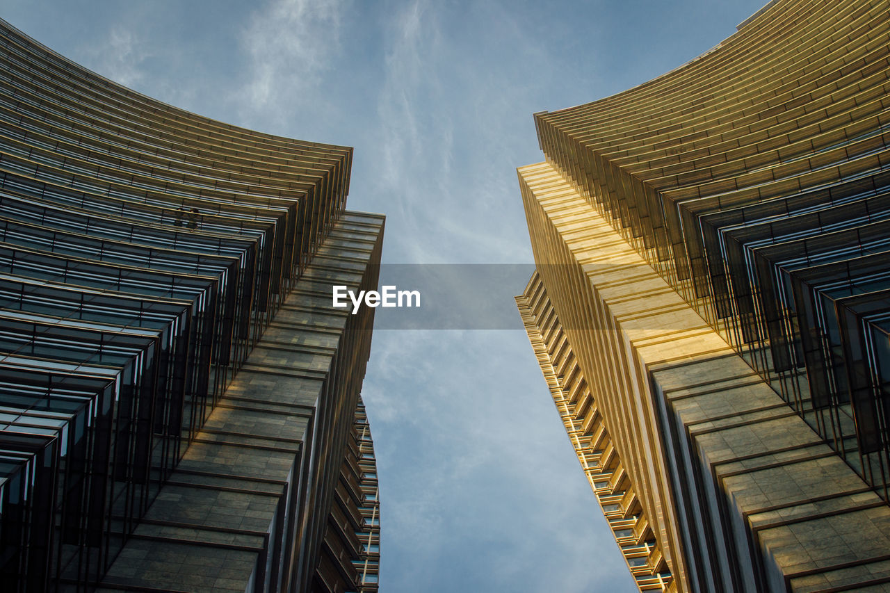 Low angle view of skyscrapers against sky