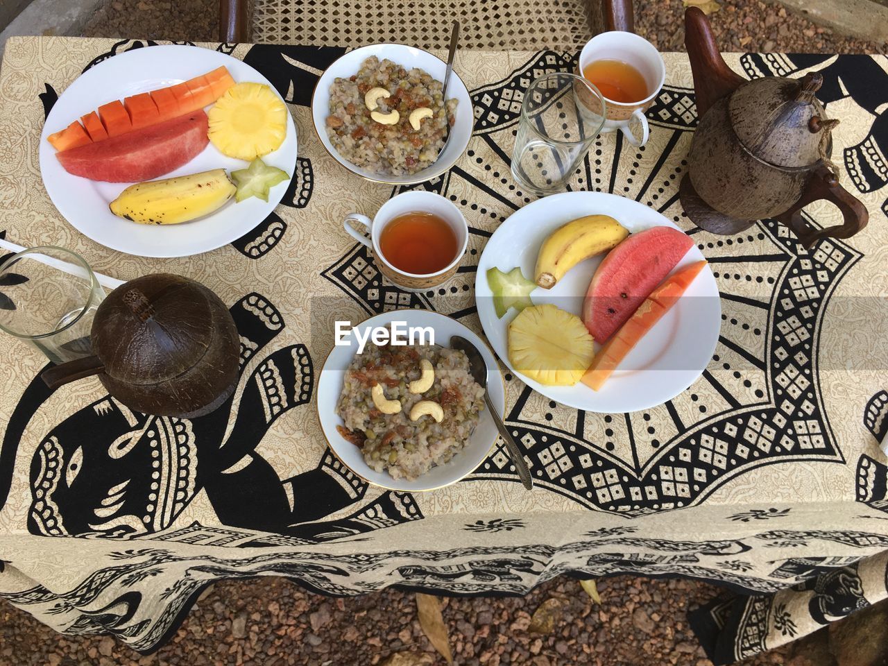 High angle view of breakfast served at table on ground