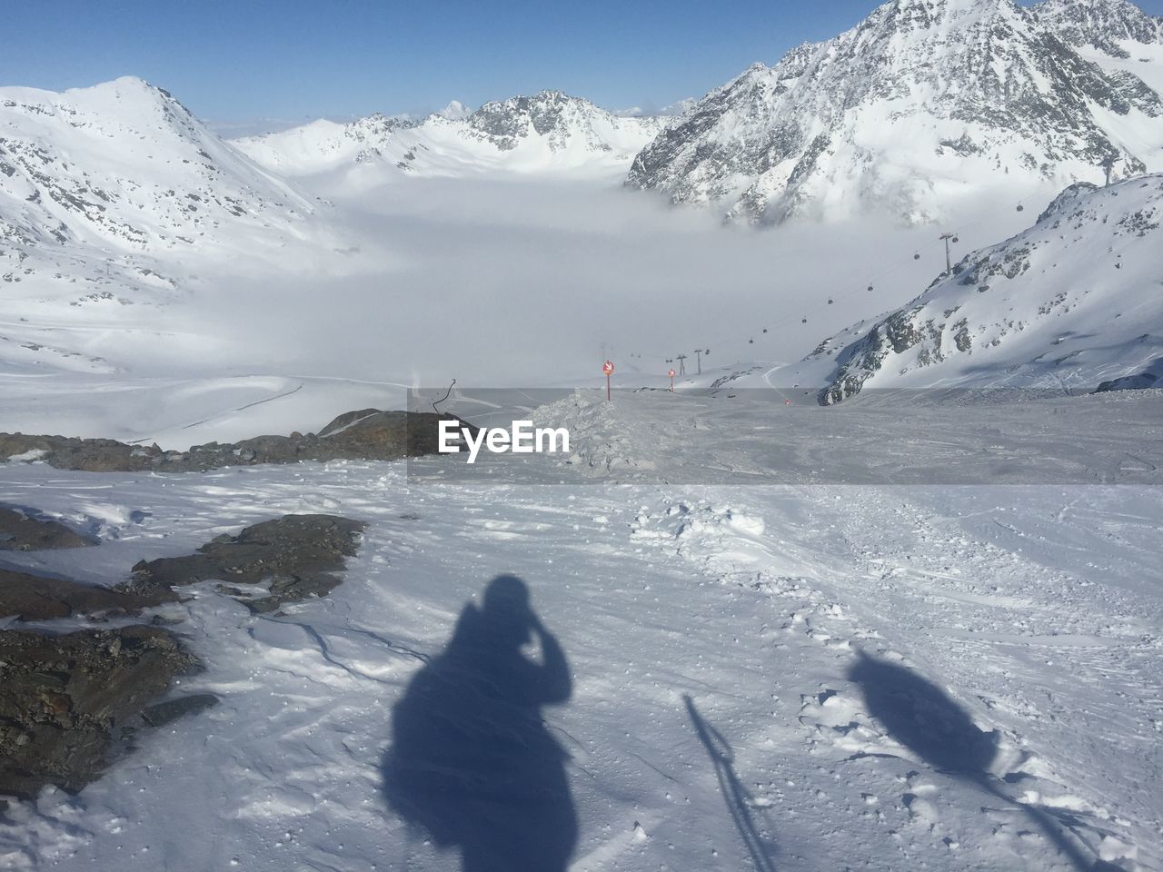 People on snow covered mountain