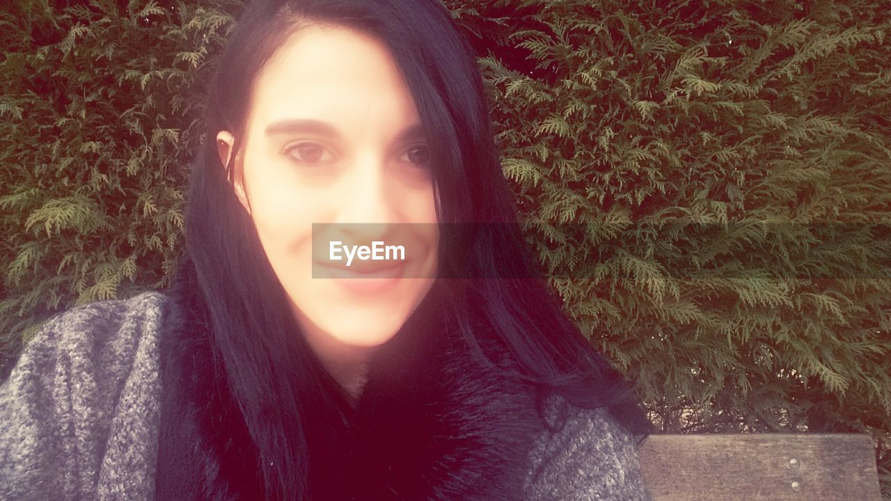 CLOSE-UP PORTRAIT OF YOUNG WOMAN WITH HAIR