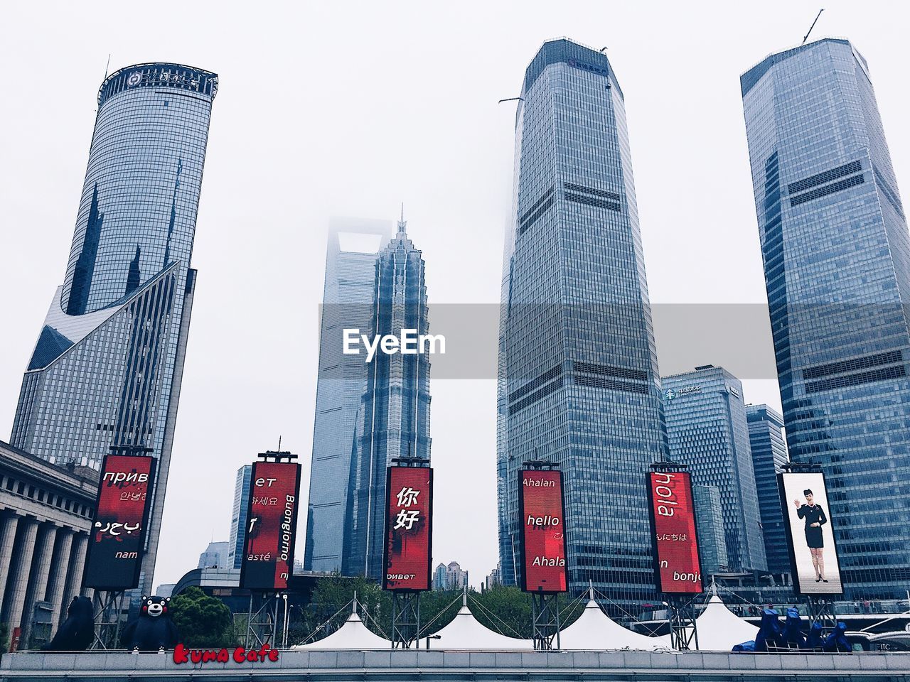 LOW ANGLE VIEW OF MODERN BUILDINGS AGAINST SKY