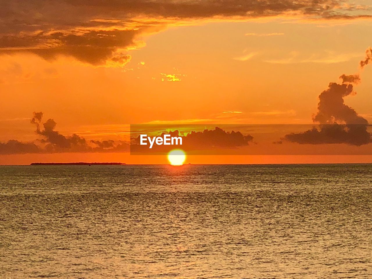 SCENIC VIEW OF SEA AGAINST ROMANTIC SKY