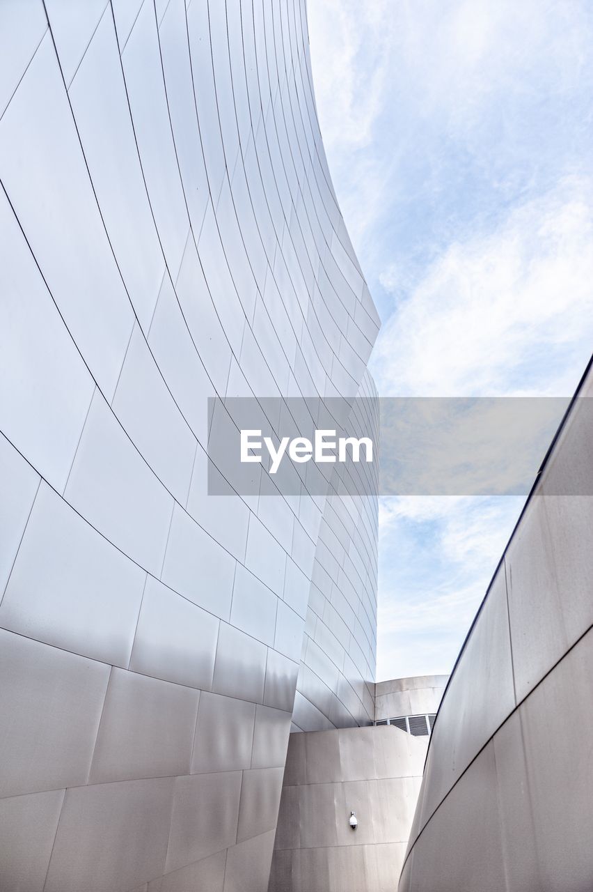 LOW ANGLE VIEW OF OFFICE BUILDING AGAINST SKY