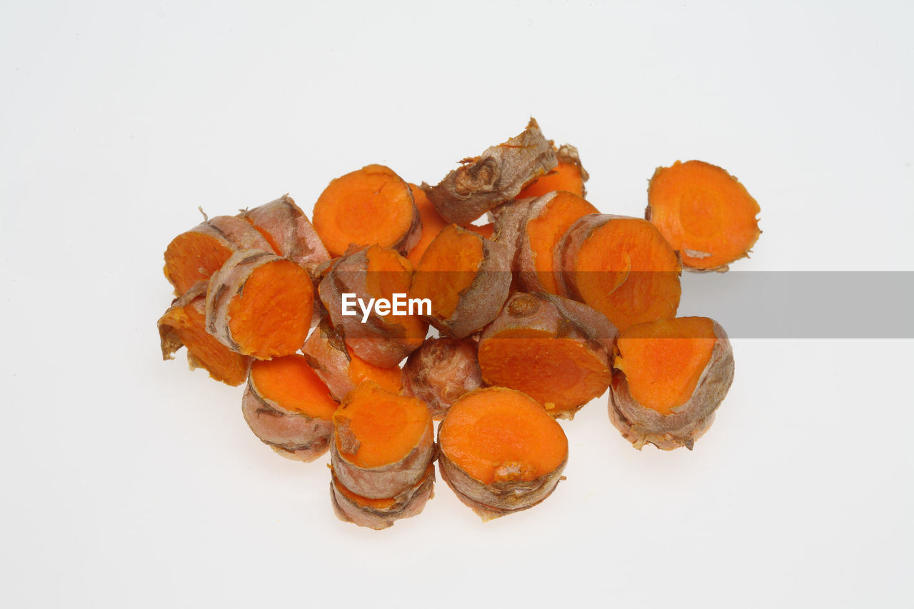 Close-up of turmeric against white background