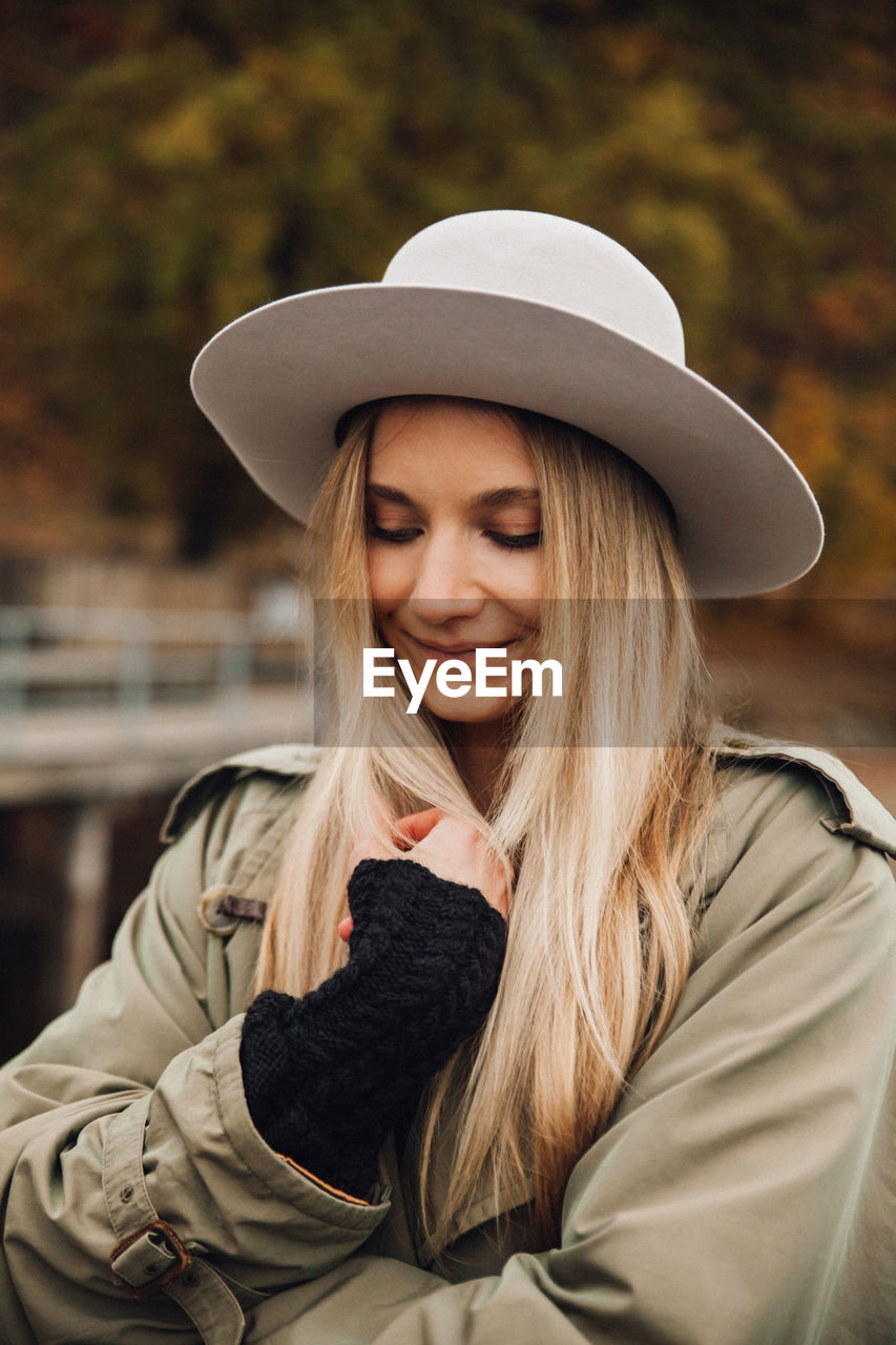 Beautiful young woman wearing hat