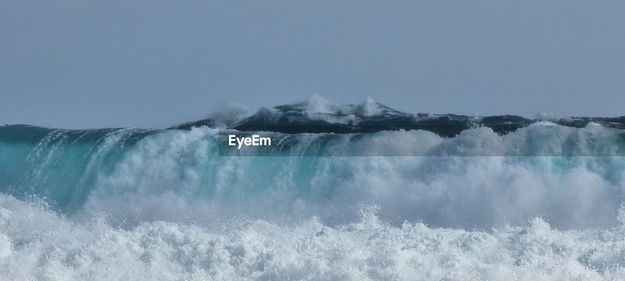 water, wind wave, motion, beauty in nature, sea, wave, scenics - nature, nature, power in nature, environment, ocean, sky, sports, no people, water sports, splashing, cold temperature, outdoors, blue, day, freezing, landscape, long exposure, winter, snow, clear sky