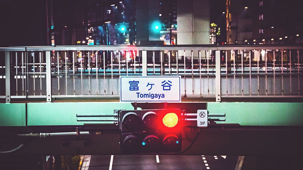 High angle view of road signal on bridge over road