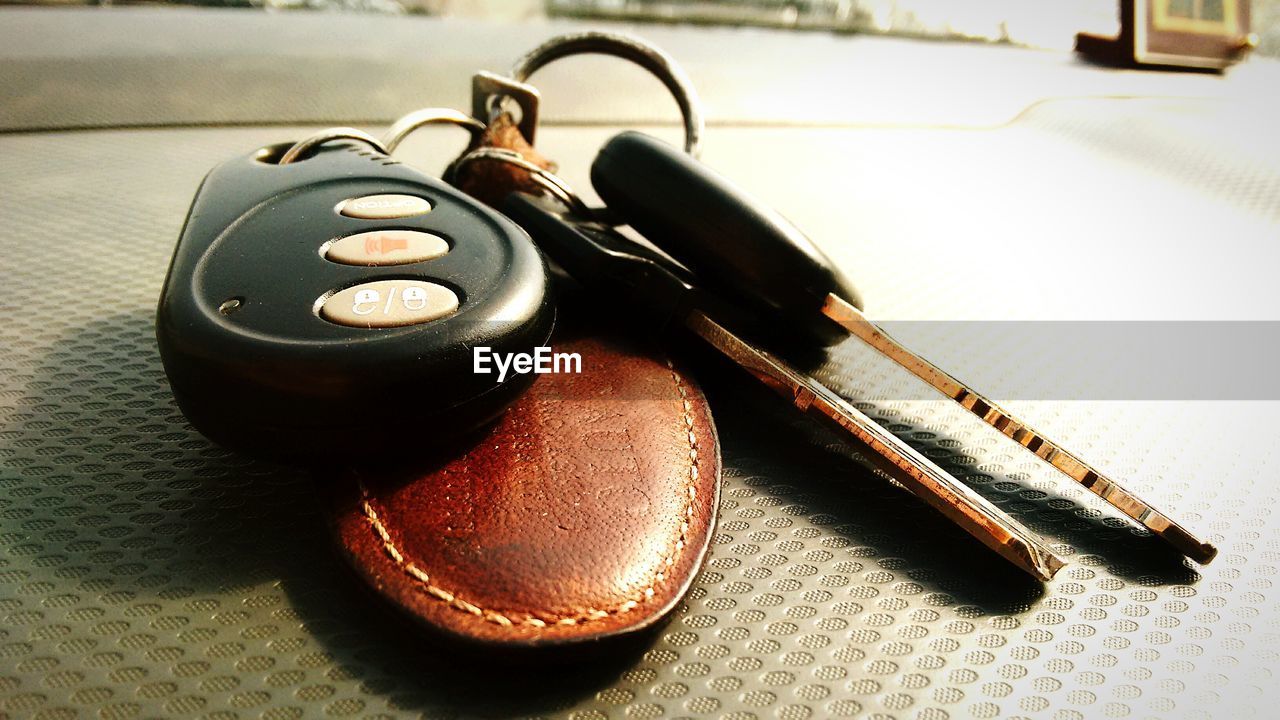 Close-up of car keys on table