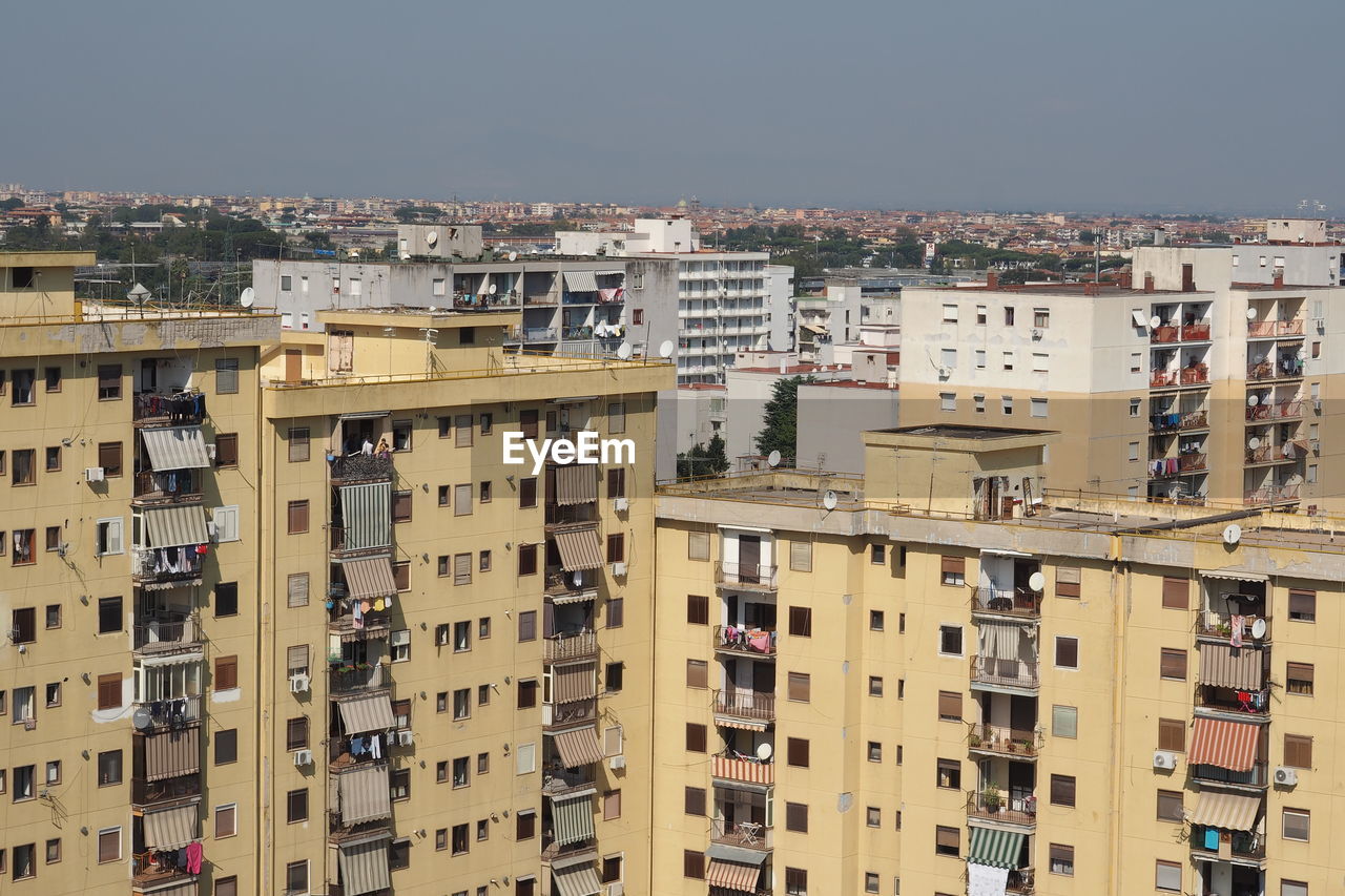 Aerial view of residential district against sky