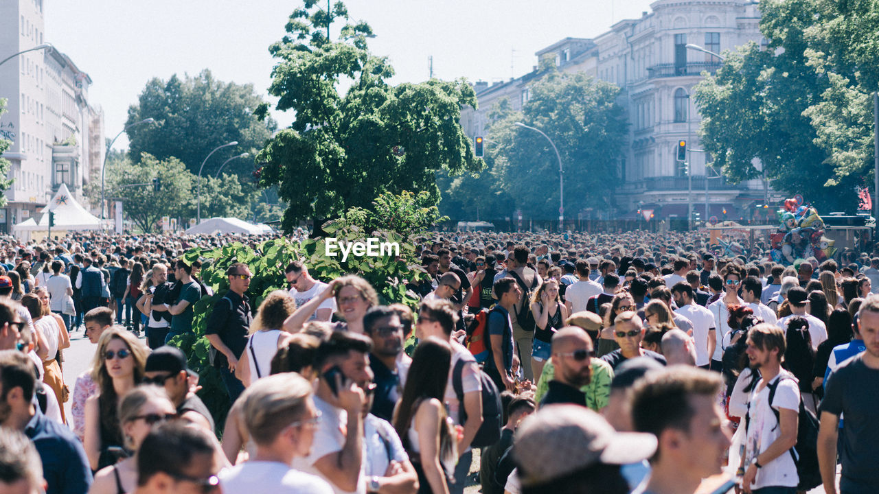 Crowd on street in city