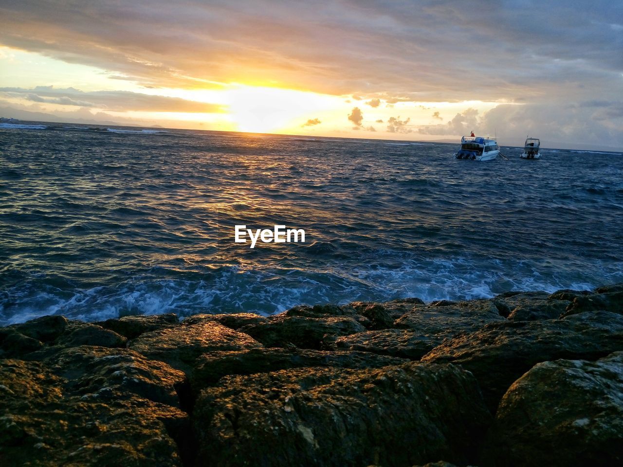 SCENIC VIEW OF SEA DURING SUNSET