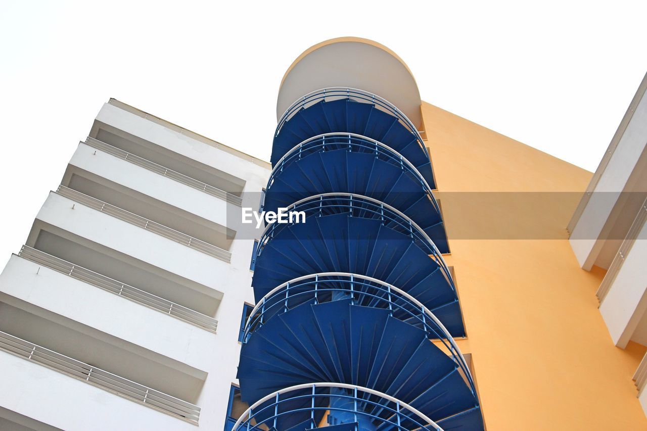 Low angle view of modern building against clear sky