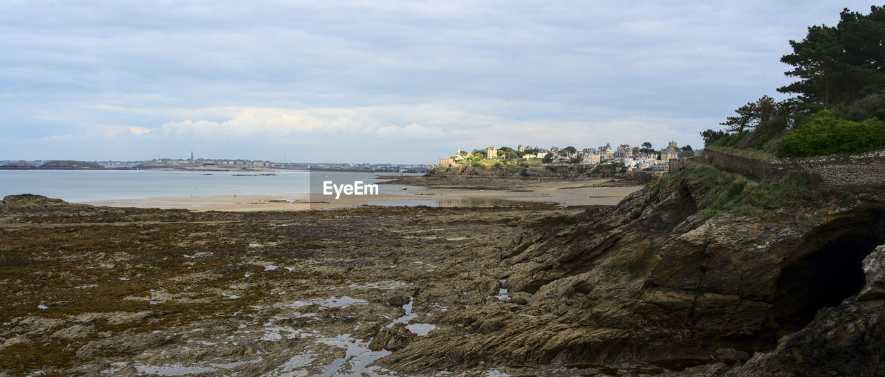 Scenic view of beach against sky