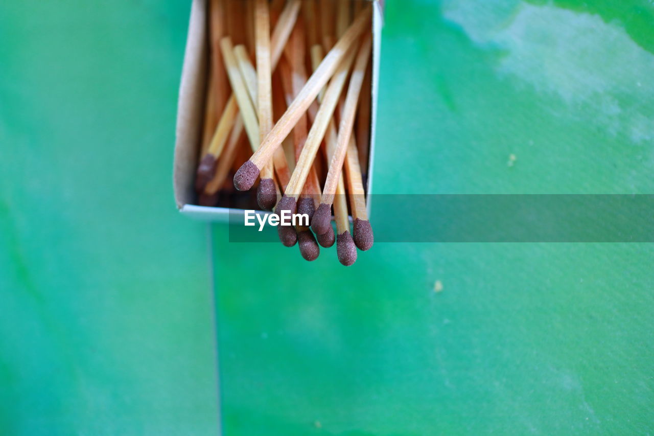 High angle view of matchsticks on table