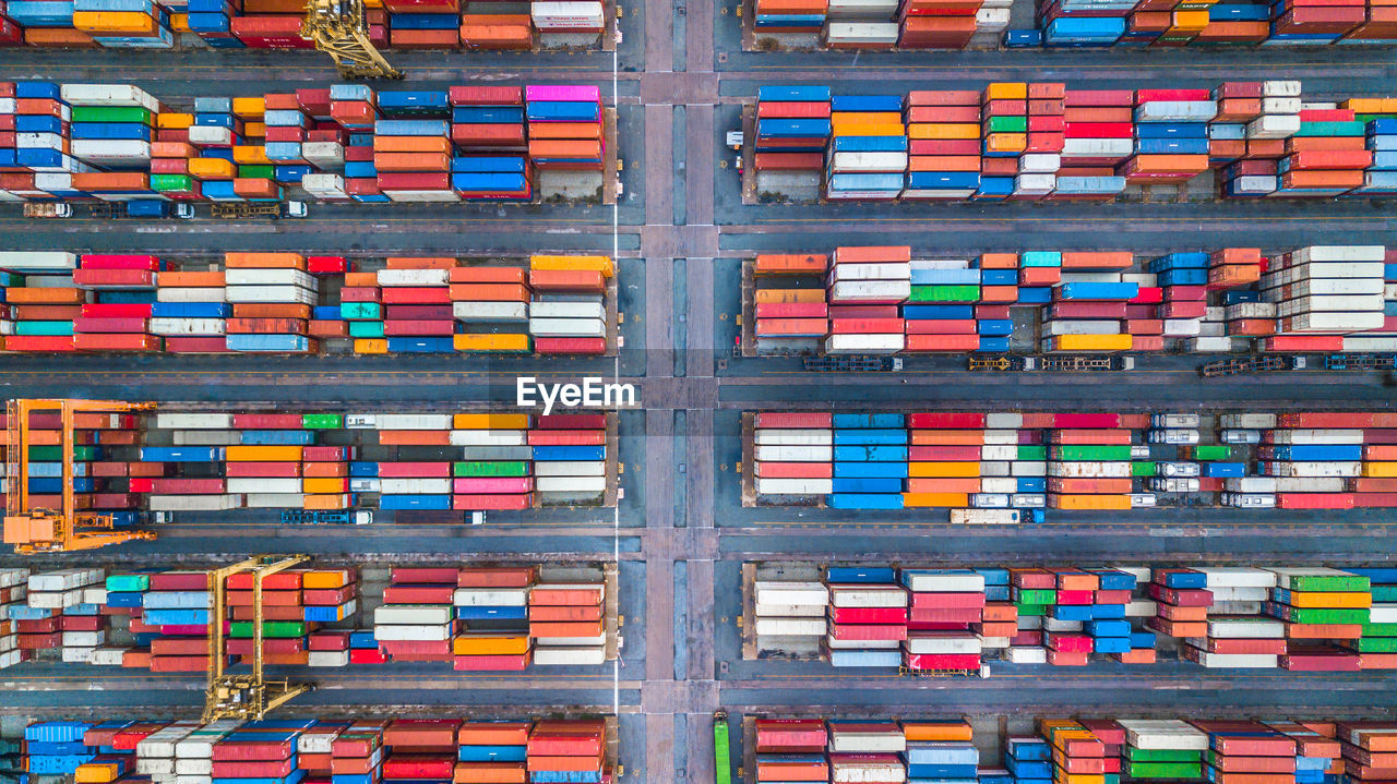 High angle view of container ship at commercial dock