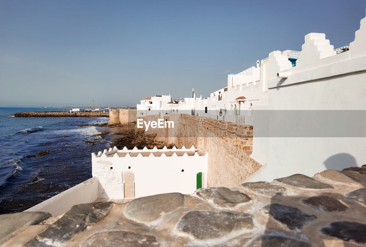 Aerial view over the old medina of asilah with the coast in morocco