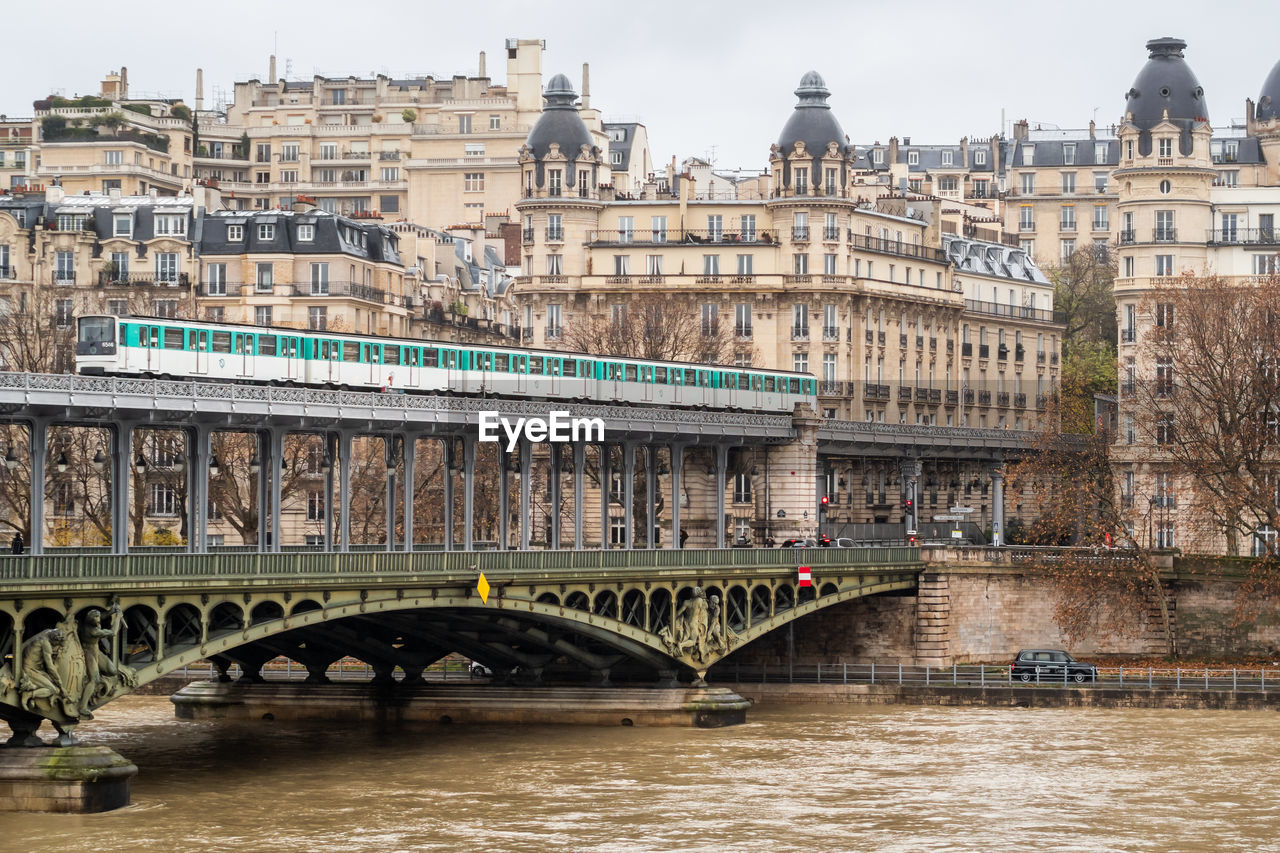 Old metro line 6 on the passy viaduct of the bir hakeim bridge in paris - france