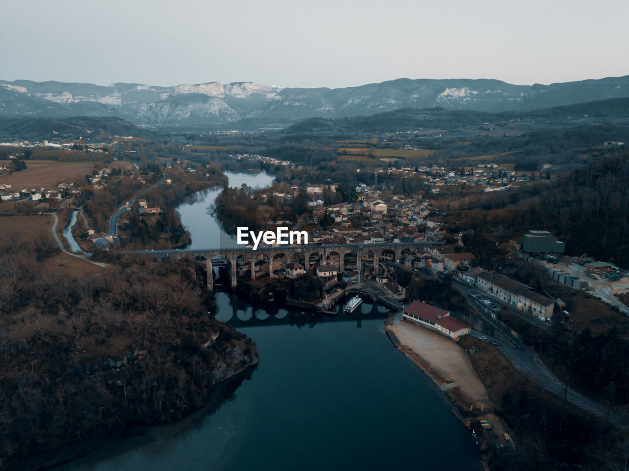 High angle view of river amidst buildings in town