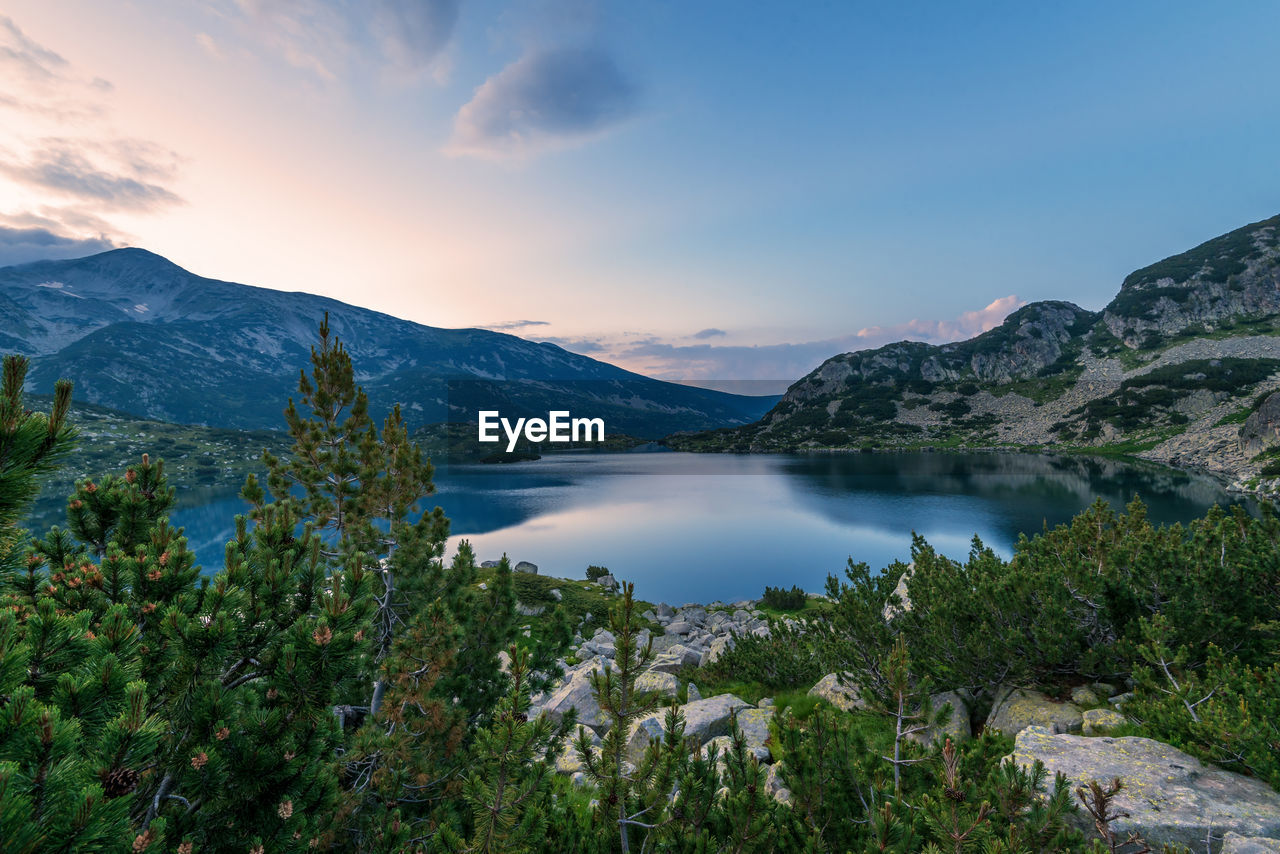 Popovo lake at bezbog, bulgaria and mountains reflection.