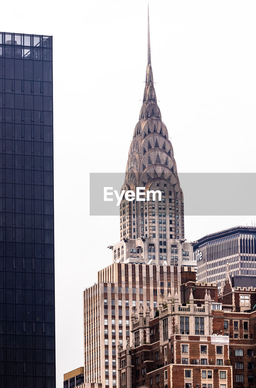 Low angle view of chrysler building against clear sky