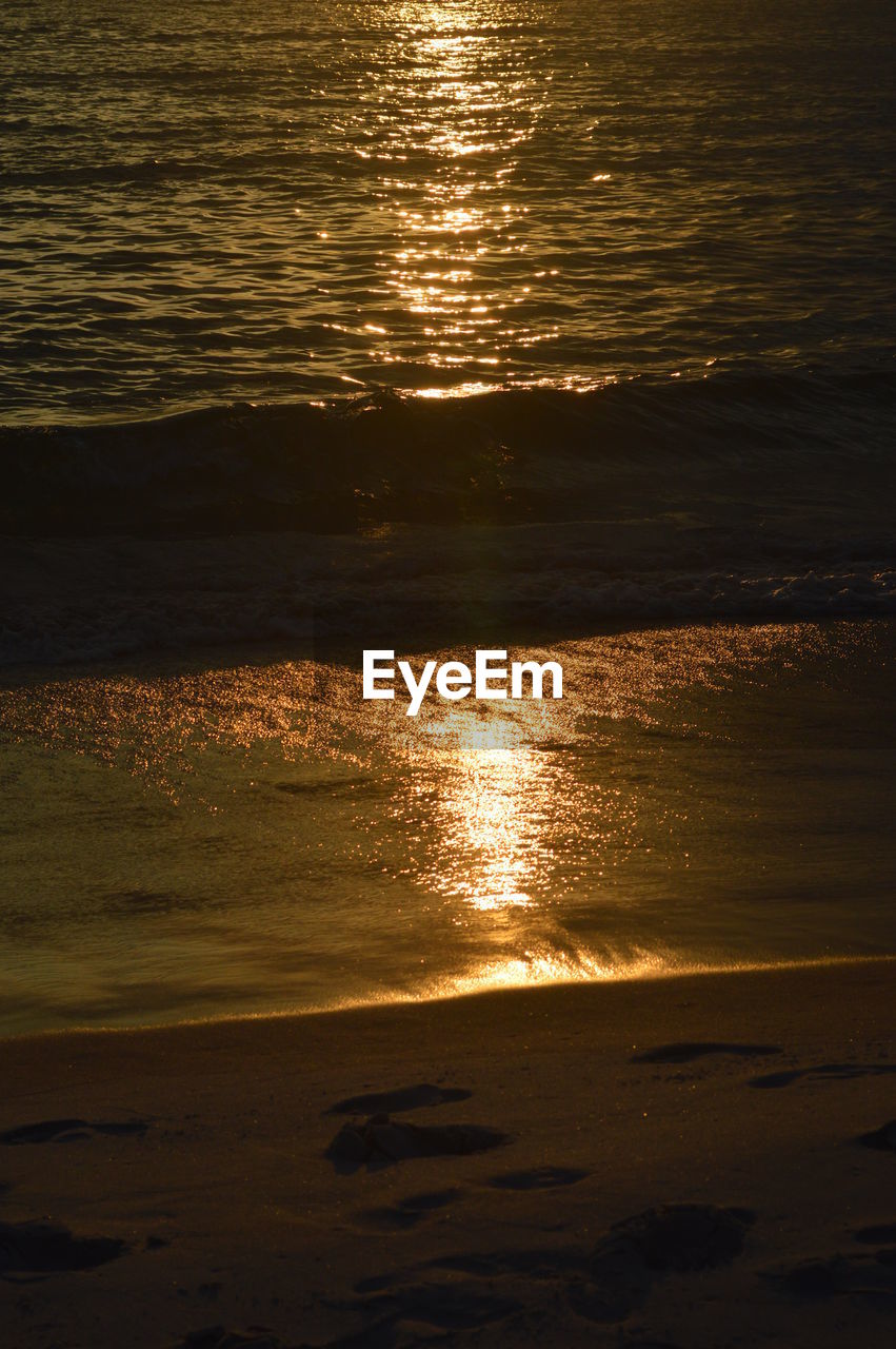 SCENIC VIEW OF SEA AGAINST SKY AT SUNSET