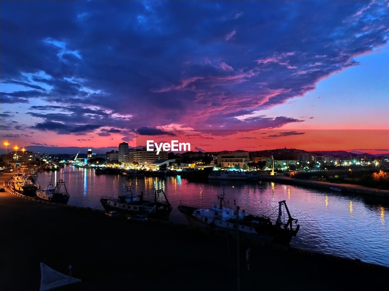 VIEW OF HARBOR AT SUNSET