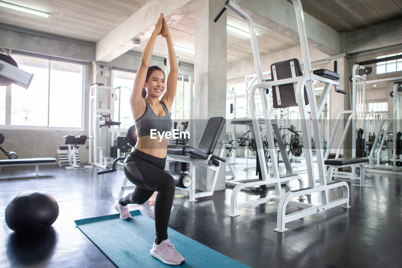 Woman exercising in gym