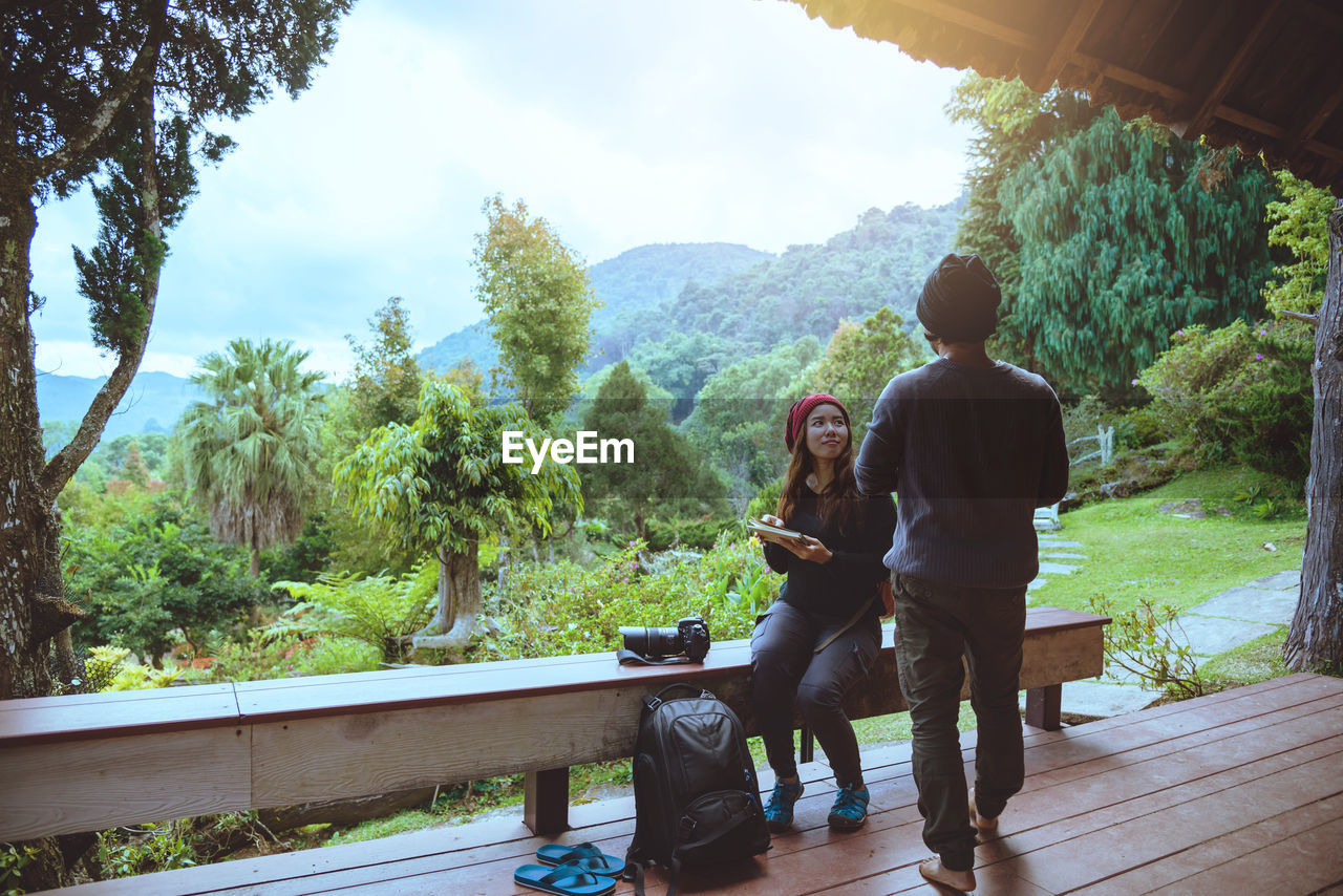 Couple sitting outdoors